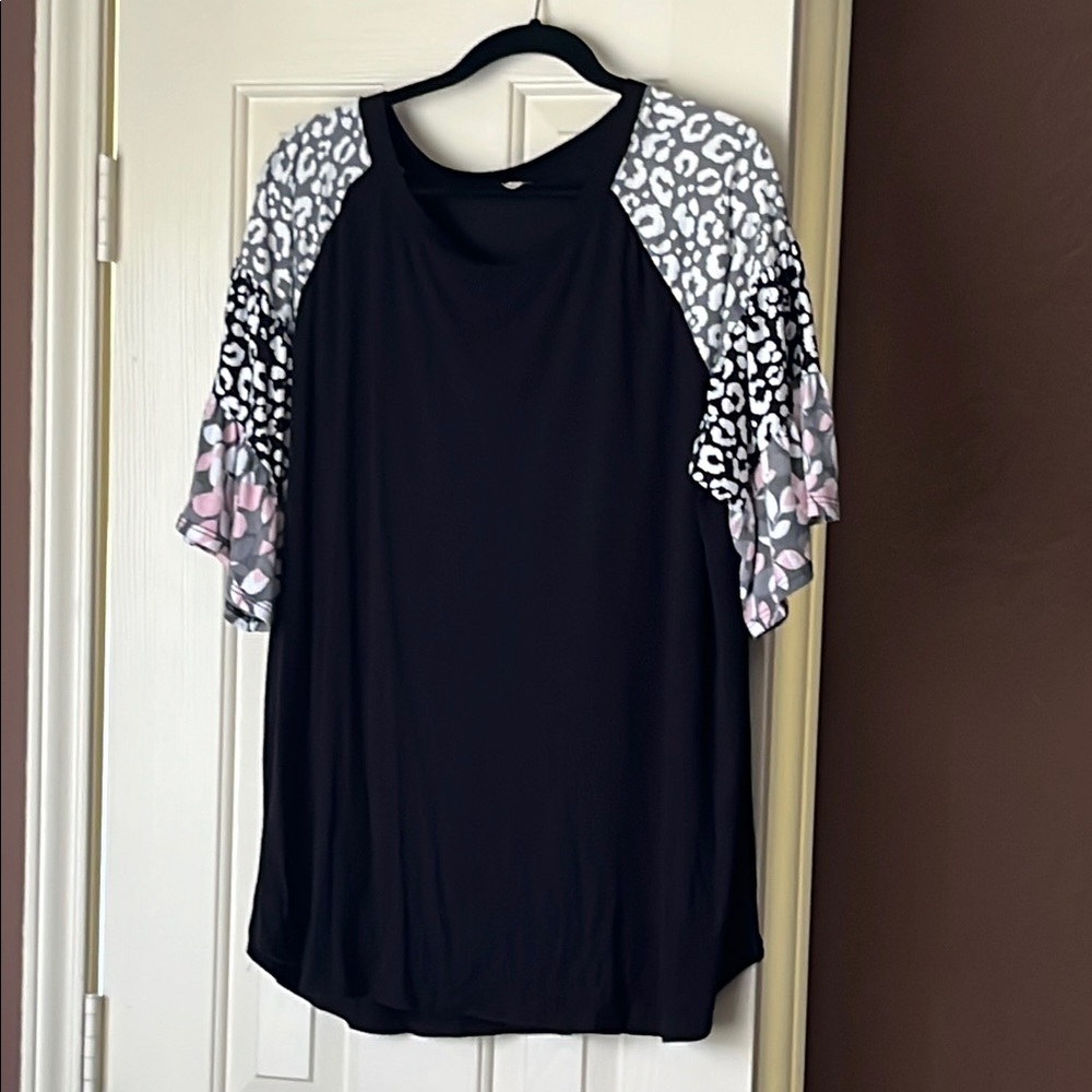 Elegant Black Top with Pink Leopard Sleeves